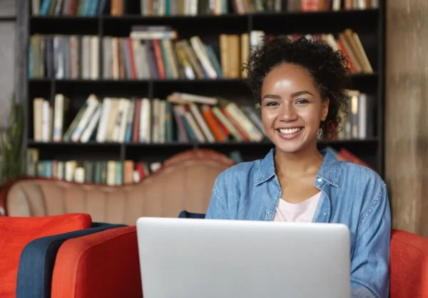 bigstock-cheerful-female-writer-with-at-198564286_front-page